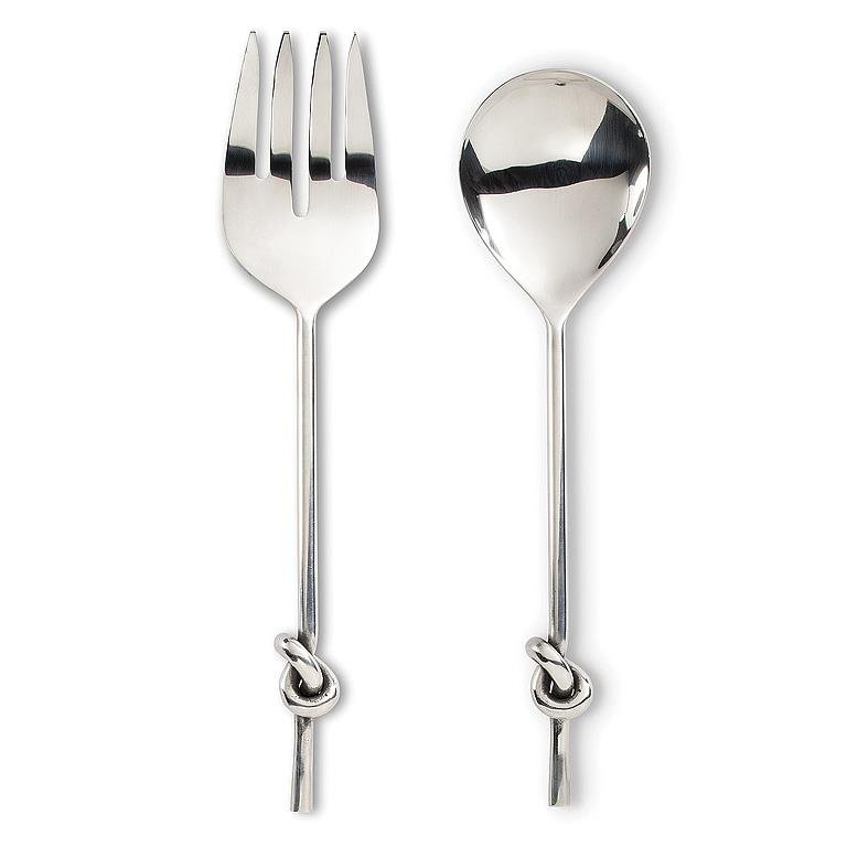 Chrome salad servers with knotted detail on handles, on a white background.