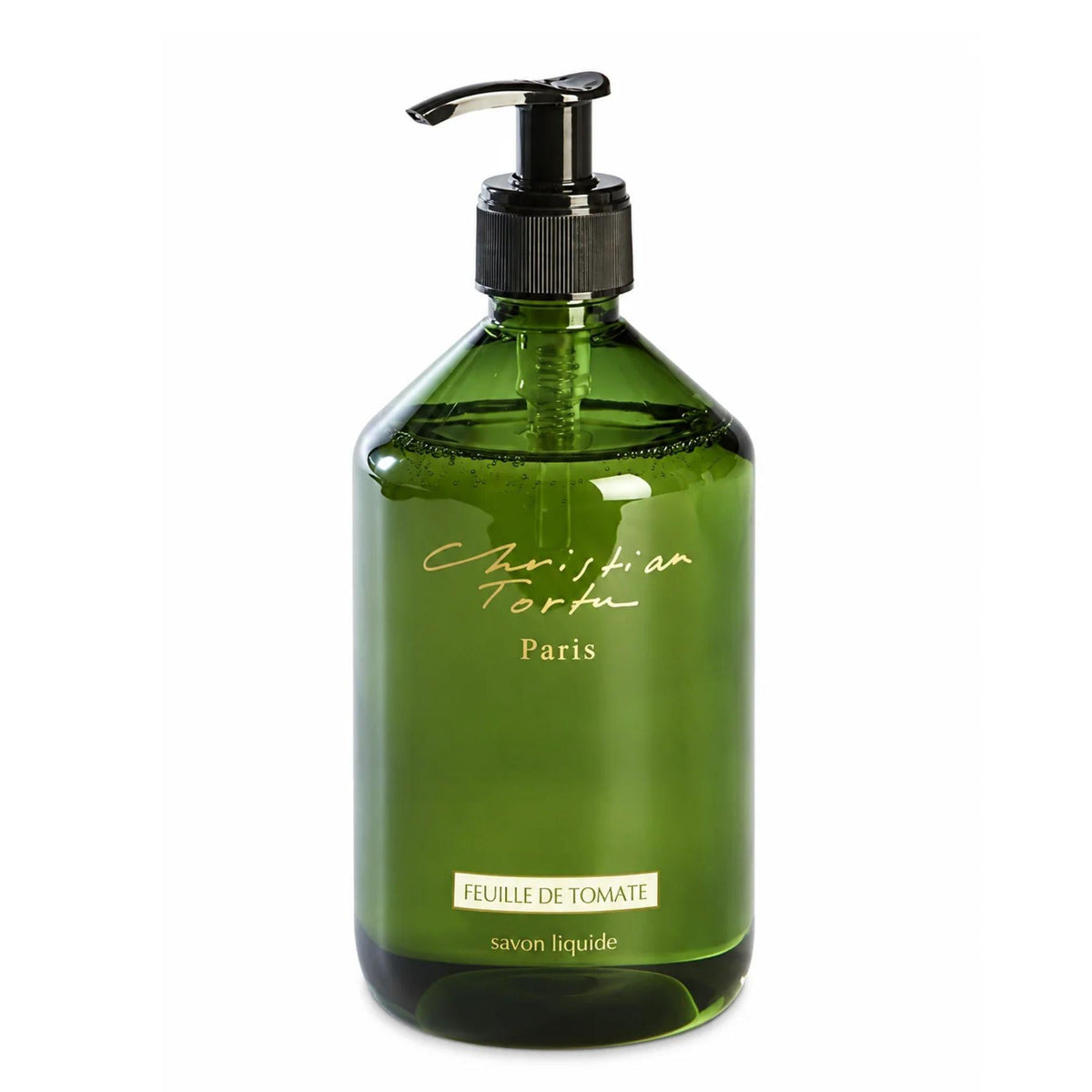 Christian Tortu's Feuille de Tomate green glass liquid soap dispenser with a black pump and gold lettering, on a white background.