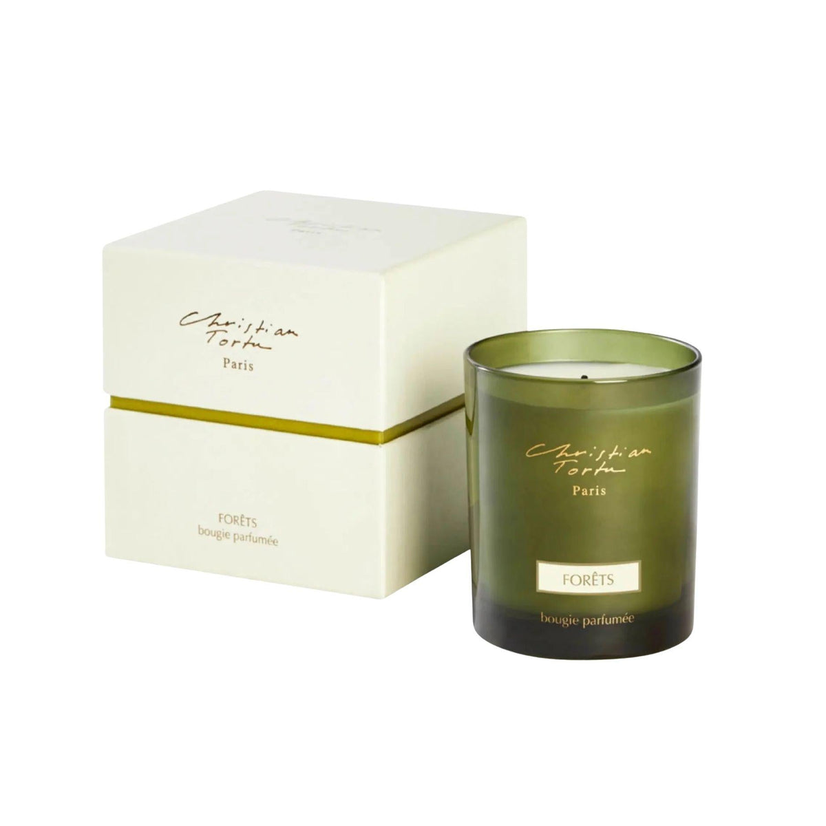 Christian Tortu's Forêts green glass scented candle with box, on a white background.