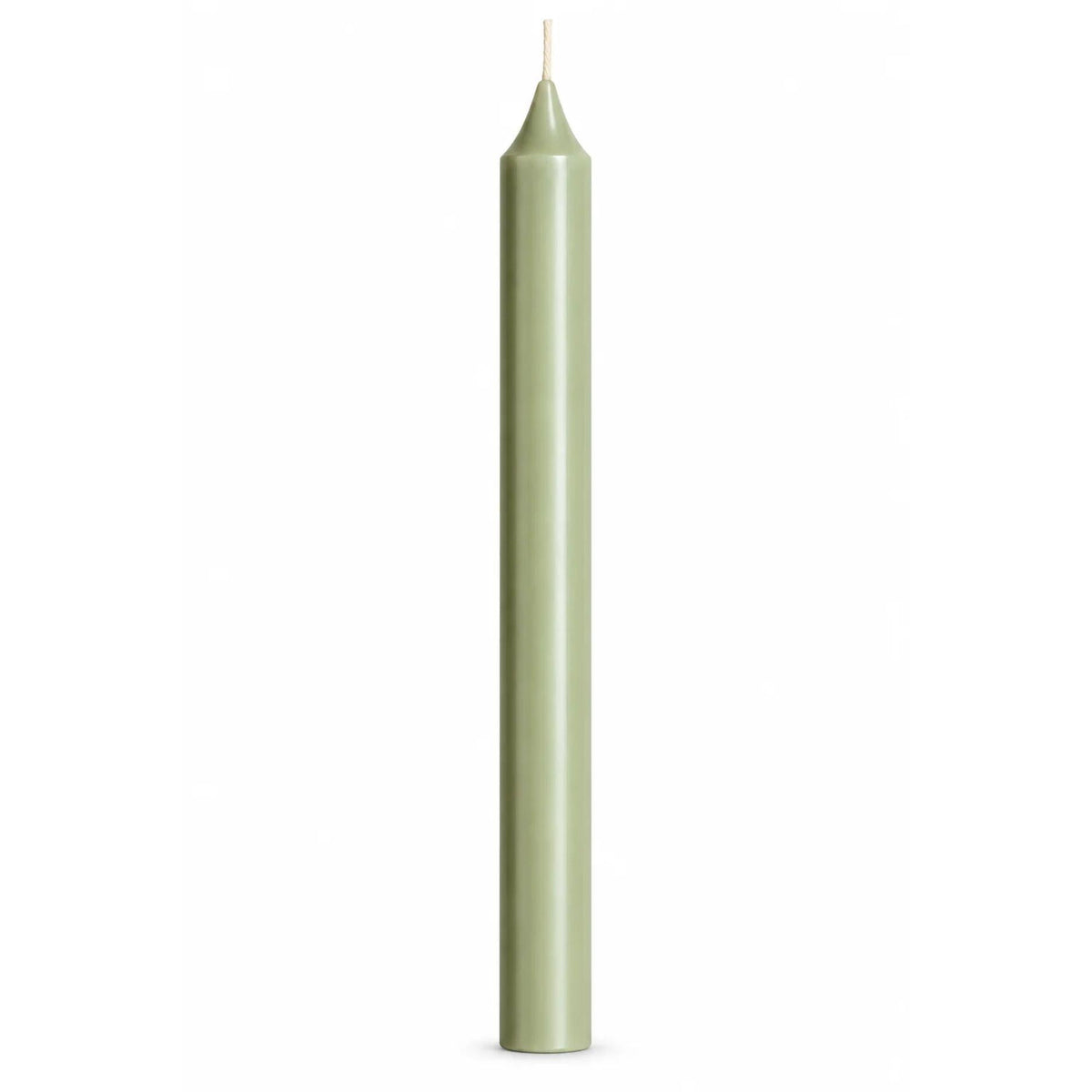 A single tall, slender pale green taper candle with a white wick, centered against a solid white background.