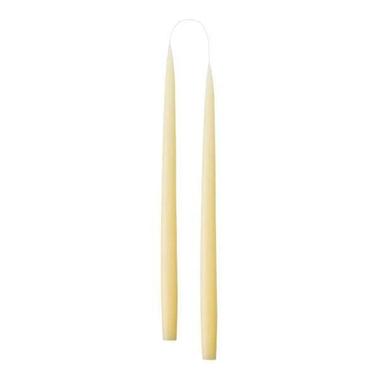 Two slim, tapered creamy white candle sticks, shown vertically against a plain white background.