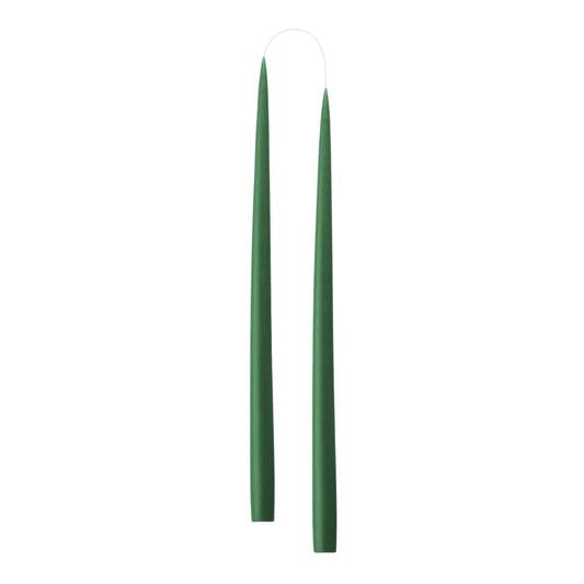 Two slim, tapered green candle sticks, shown vertically against a plain white background.