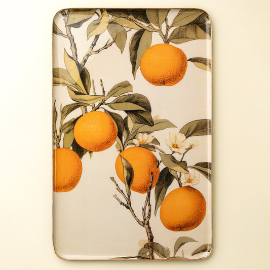 Extra large enamel tray with orange and leaf design on a beige background.