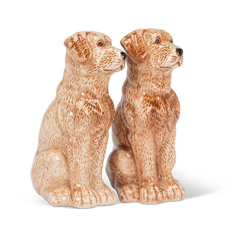 Two ceramic retriever salt and pepper shakers in a sitting pose, decorated with a speckled brown and cream glaze, set against a plain white background.