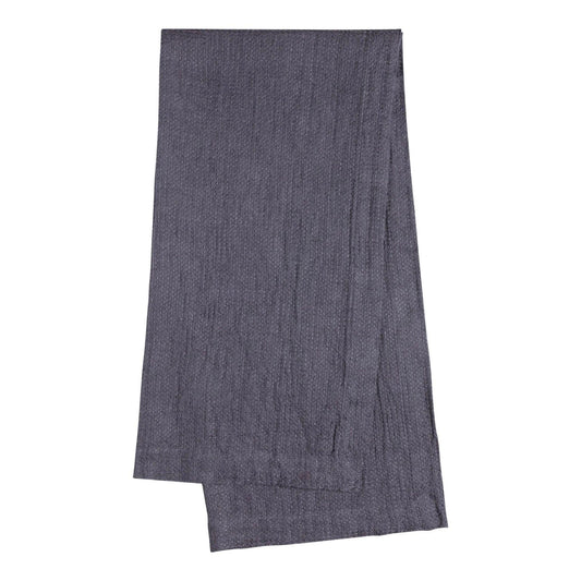 A folded dark gray textured sauna towel shown against a plain white background.
